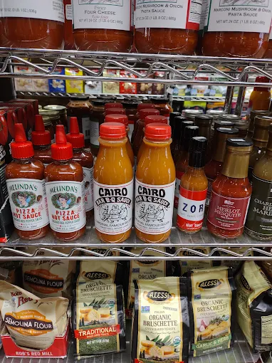 Shelves of sauces, pasta, and Italian pantry goods