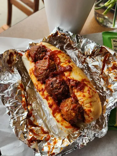 Foil-wrapped sandwich from the Louie's deli